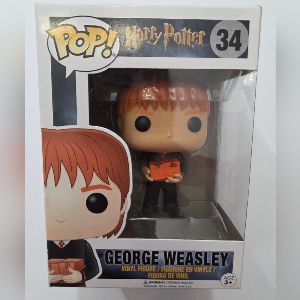Funko George Weasley Figure with Weasleys Wizard Wheezes Boxes. New In Box.